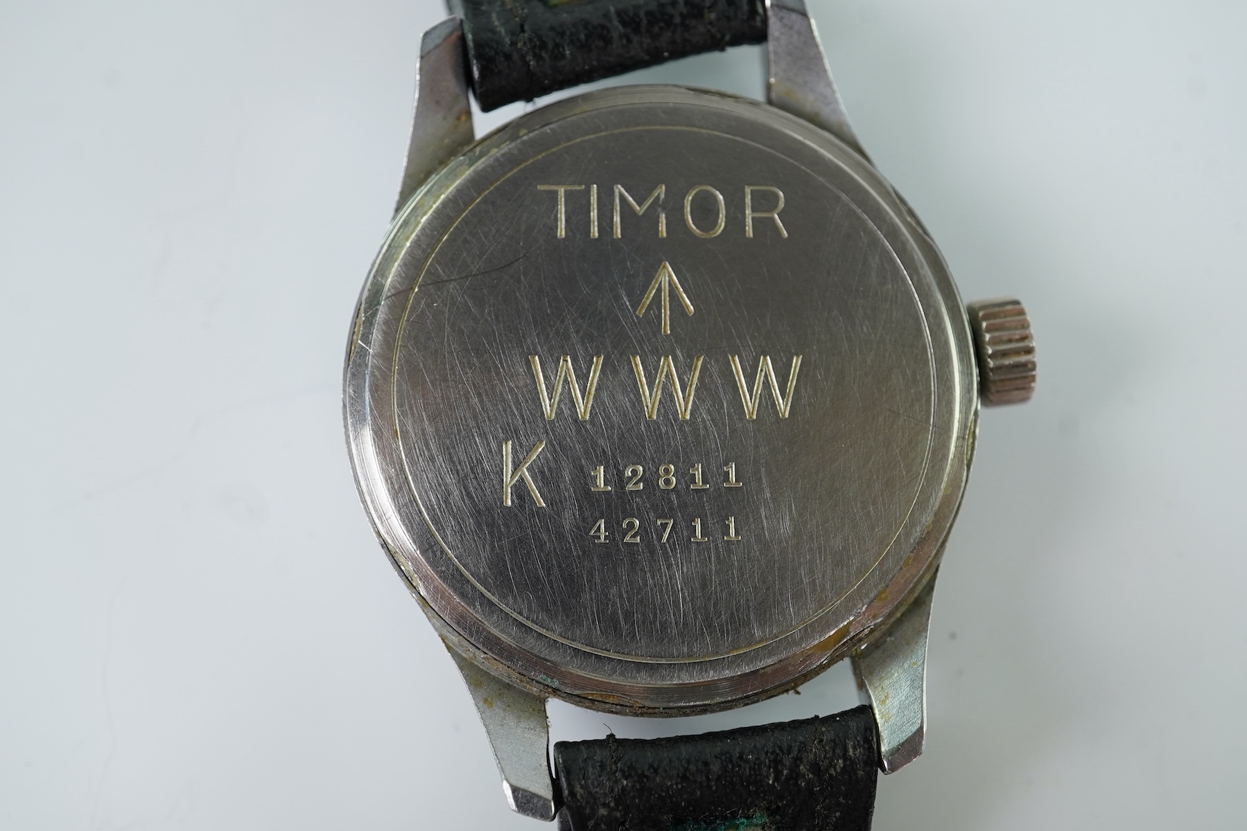 A gentleman's steel Timor WWW British Military 'Dirty Dozen' manual wind wrist watch, circa 1945